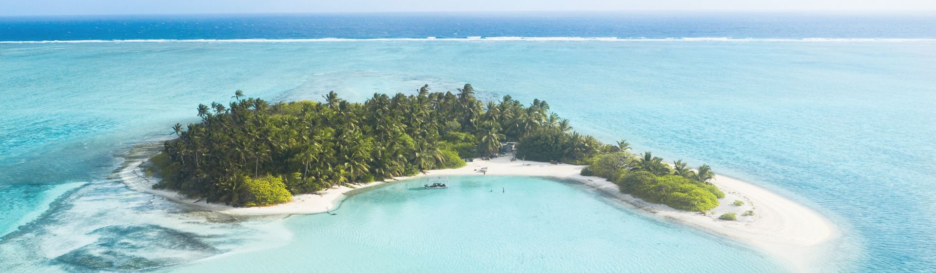 Aerial view of an island in crystal-clear waters, Cocos Keeling Islands, Australia