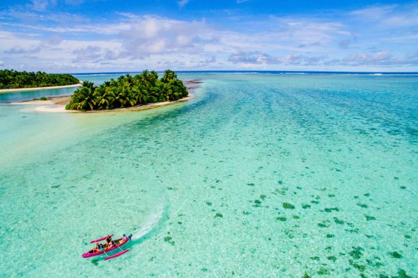 Aerial view of a motorised canoe near the waters of Cocos keeling Islands